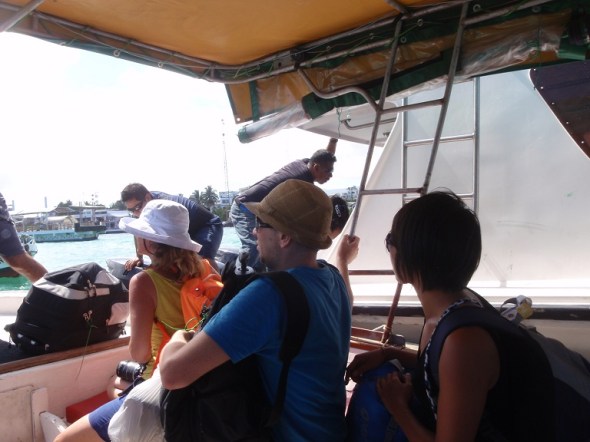 Boarding from water taxis into the ferry boat. 