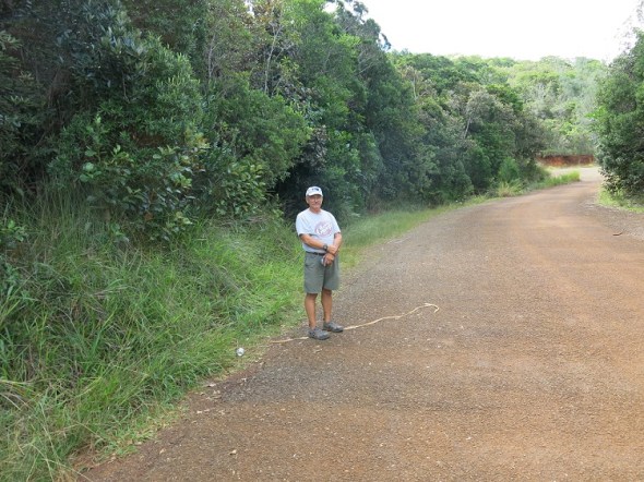 My dad taking a break from driving enjoying the outdoors. 